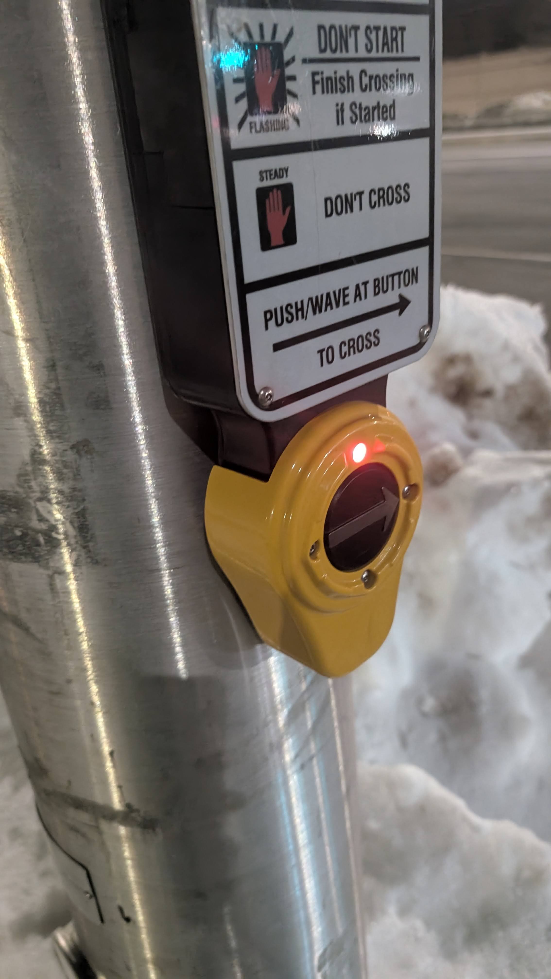 Was waiting at the intersection and recorded the pedestrian button.